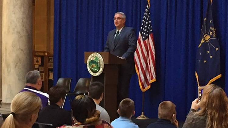 Gov. Eric Holcomb speaks to foster families at the Statehouse. - Jill Sheridan/IPB News