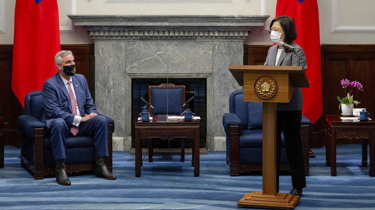 In this photo released by the Taiwan Presidential Office, Taiwan's President Tsai Ing-wen speaks during a meeting with  Indiana Gov. Eric Holcomb at the Presidential office in Taipei, Taiwan, Monday, Aug 22, 2022. Holcomb met with Tsai Monday morning, following two recent high-profile visits by U.S. politicians that drew China's ire and Chinese military drills that included firing missiles over the island. - Taiwan Presidential Office via AP
