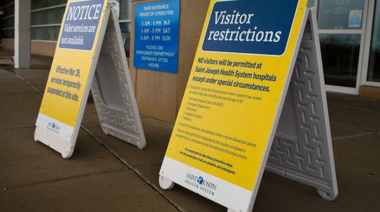 Signs detail the restrictions for visitors at St. Joseph Hospital in Mishawaka, Indiana.  - Justin Hicks/IPB News