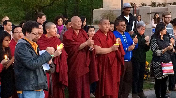 Supporters gather for a vigil for victims of the earthquake in Nepal, Thursday evening in Bloomington. - Casey Kuhn