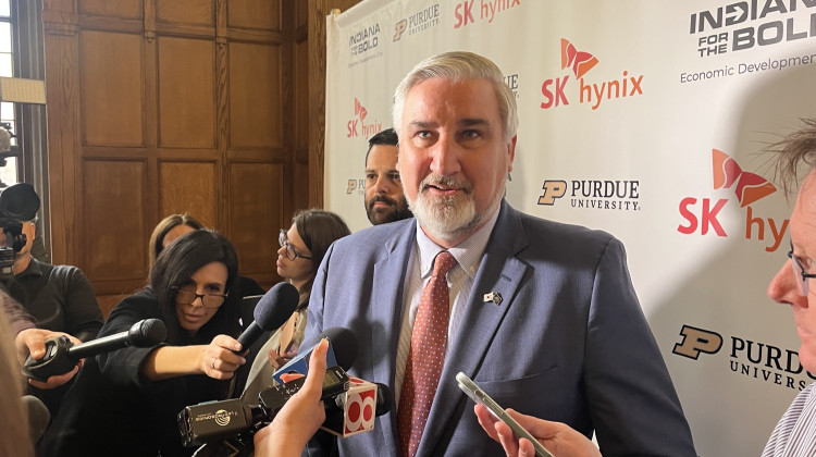 Gov. Eric Holcomb discusses his thoughts on a global tech manufacturer's plans to invest almost $4 billion to build a new semiconductor plant in Indiana. - Violet Comber-Wilen / IPB News