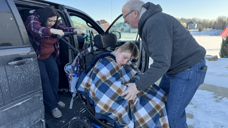 Jackson Dewitt is one of around 1,600 children who receive services through the Attendant Care Program. The stipend his mother, Jennifer, gets for providing around-the-clock care for him helped the family stay afloat. - Elizabeth Gabriel / Side Effects Public Media