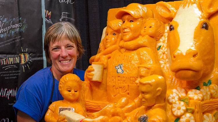 Sarah Kaufmann spent the first week of the Indiana State Fair whittling away at more than 1,500 pounds of Indiana cheddar to create this sculpture. - Doug Jaggers