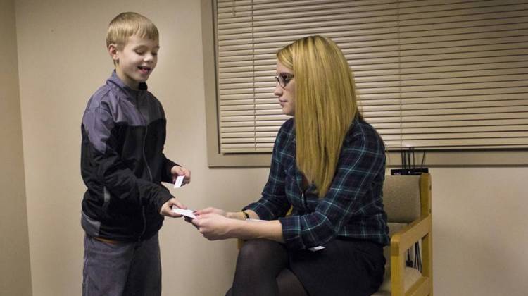 Shaw, 8, plays an improv game with Erin McTiernan, an Indiana State University doctoral student. Shaw is a participant in an improv class at Indiana State University for children with high functioning autism. - Peter Balonon-Rosen/Indiana Public Broadcasting