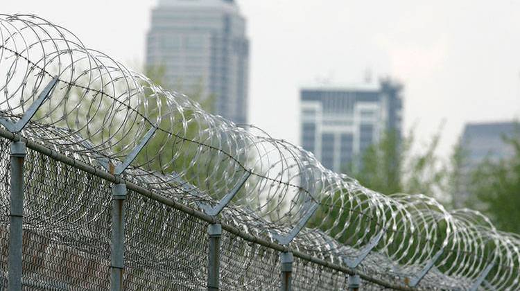 Razor wire lines the fence at the Indiana Women's Prison in Indianapolis, Monday, April 28, 2008.  - AP Photo/Michael Conroy
