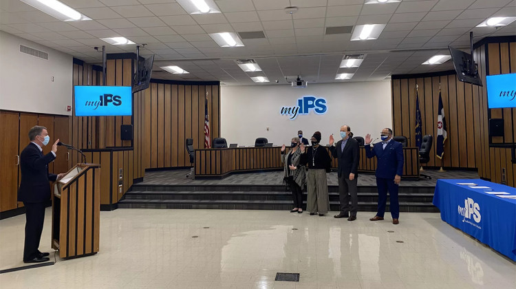 Indianapolis Mayor Joe Hogsett swears in four school board members, Diane Arnold, Venita Moore, Will Pritchard, and Kenneth Allen, to the IPS school board on Monday, Jan. 4, 2020. - Aaricka Washington/Chalkbeat