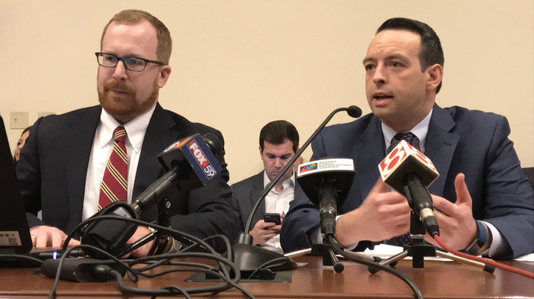 State Budget Director Jason Dudich, left, and Office of Management and Budget Director Micah Vincent, right, present Gov. Eric Holcomb's proposed budget. - Brandon Smith/IPB News