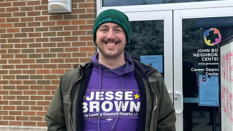 Jesse Brown greeted voters outside the John Boner Neighborhood Center on the city's near eastside. He won the primary vote for City County Councilor for District 13. (Sydney Dauphinais/WFYI)