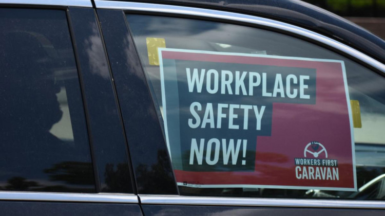 A sign in a car caravan at a labor rally in 2019 reads "Workplace Safety Now!" - Justin Hicks/IPB News