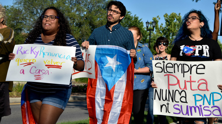 Residents of South Bend shout "Ricky Renuncia" at a rally showing solidarity with protestors in San Juan. - Annacaroline Caruso/WVPE