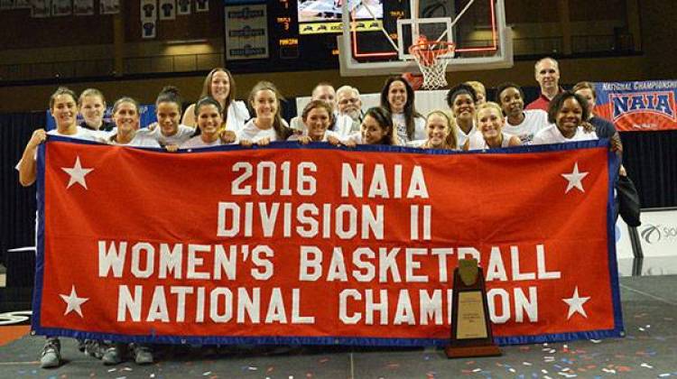 The Marian University women's basketball team celebrates its NAIA Div. II national championship in Sioux City, Iowa Tuesday night. - Courtesy Marian University