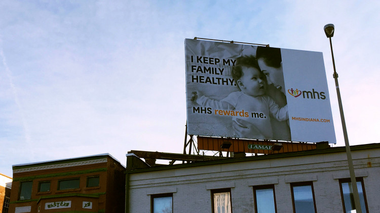 An Indianapolis billboard for MHS, one of the two insurers offering coverage on the Affordable Care Act marketplace in Indiana. (FILE PHOTO: Sarah Fentem/Side Effects Public Media)