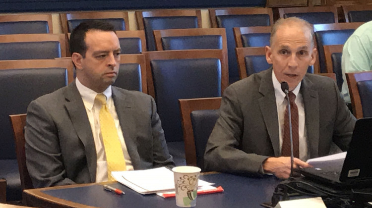 Office of Management and Budget Director Micah Vincent, left, and Indiana Finance Authority COO Jim McGoff discuss the Toll Road lease at the State Budget Commitee. - Brandon Smith/IPB News