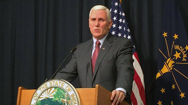Gov. Mike Pence says he enthusiastically supports the local road funding plan approved by lawmakers. - file photo