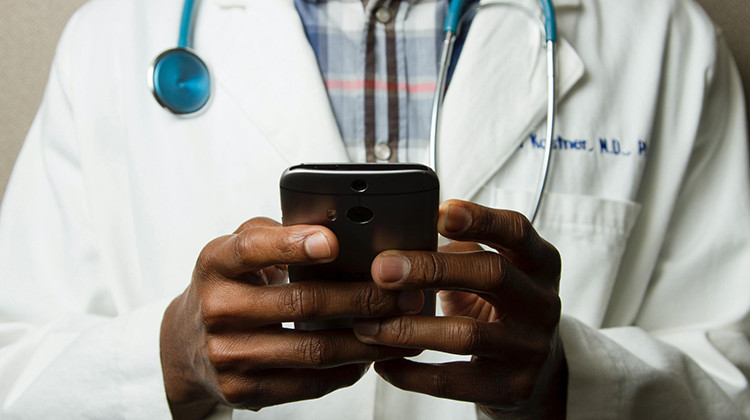 Recently relaxed guidlines from CMS now allows doctors to connect with patients through FaceTime or over the phone.  - Photo by National Cancer Institute on Unsplash