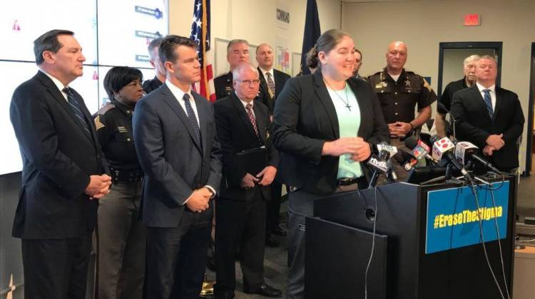 In this file photo taken in April 2017, Lebanon police officer Taylor Nielsen discusses her struggle with mental health issues while Sen. Joe Donnelly (D-Ind.), at far left, and Sen. Todd Young (R-Ind.), right of Donnelly, listen. -  Brandon Smith/IPB News