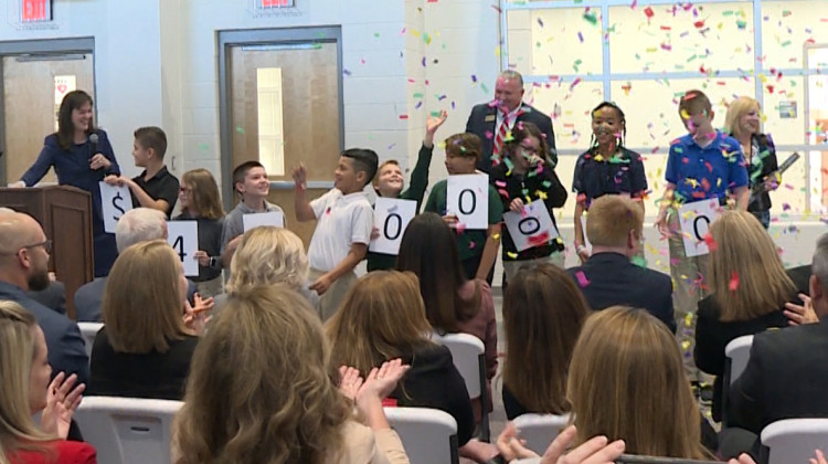 Students helped announce how much funding the grant award included, at a school in the Perry Township district Tuesday. - Jeanie Lindsay/IPB News