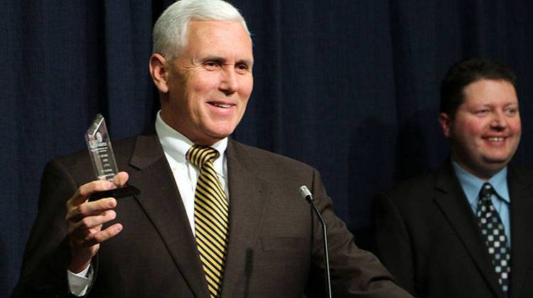 Pence Announces Tax Conference; Receives Award