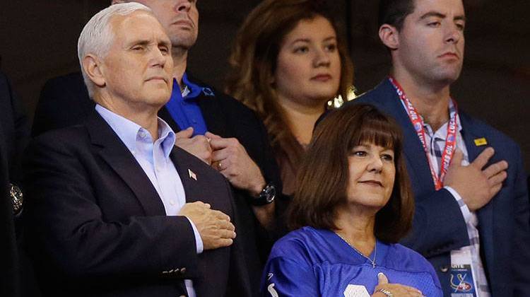 Vice President Mike Pence and his wife, Karen, stand during the playing of the national anthem before an NFL football game between the Indianapolis Colts and the San Francisco 49ers, Sunday, Oct. 8, 2017, in Indianapolis. - AP Photo/Michael Conroy