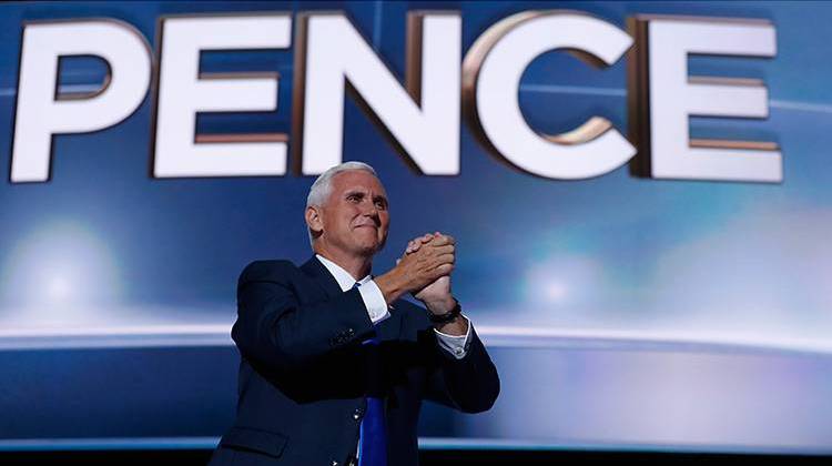 Republican vice presidential candidate Gov. Mike Pence, R-Ind., gestures as he arrives on stage to deliver his acceptance speech during the third day session of the Republican National Convention in Cleveland, Wednesday, July 20, 2016.  - AP Photo/Mary Altaffer