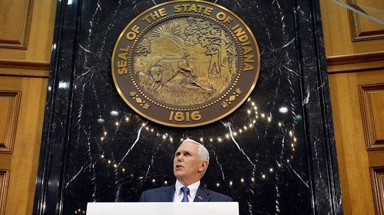 Indiana Gov. Mike Pence delivers his State of the State address to a joint session of the legislature at the Statehouse.  - AP Photo/Darron Cummings