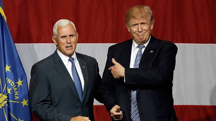 Indiana Gov. Mike Pence joins Republican presidential candidate Donald Trump at a rally in Westfield, Ind., Tuesday, July 12, 2016. - AP Photo/Michael Conroy