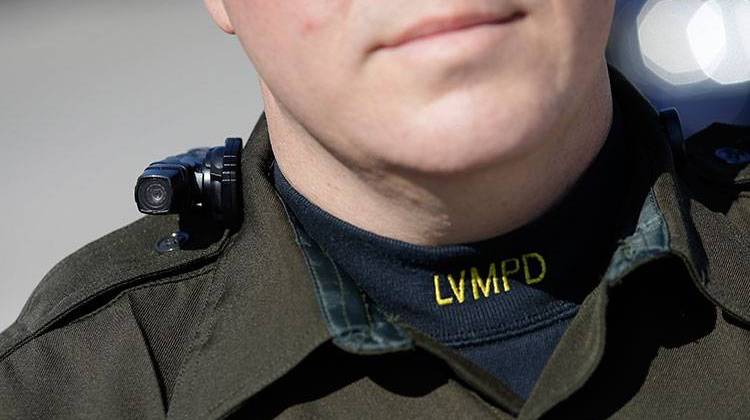 Las Vegas police Sgt. Peter Ferranti models a body camera Wednesday, Nov. 12, 2014, in Las Vegas. The camera is the same type now being used by about 200 street officers in Las Vegas. - AP Photo/John Locher
