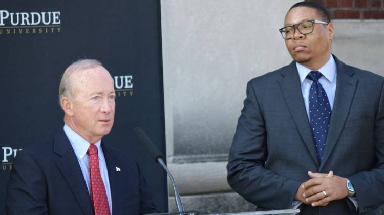 Purdue University President Mitch Daniels discusses the Purdue Polytechnic High School at its future home in the PR Mallory Building, 3029 E. Washington St., on the east side of Indianapolis as Indianapolis Public Schools Superintendent Lewis Ferebee listens on Monday, Oct. 3, 2016. The charter school will be part of the IPS district under a contract that makes IPS accountable for student's state funding and their their academic outcomes. - Eric Weddle / WFYI Public Media