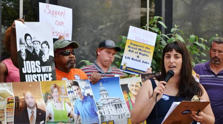 Labor rights advocate Mary Kate Dugan at a rally Monday. - Ryan Delaney/WFYI