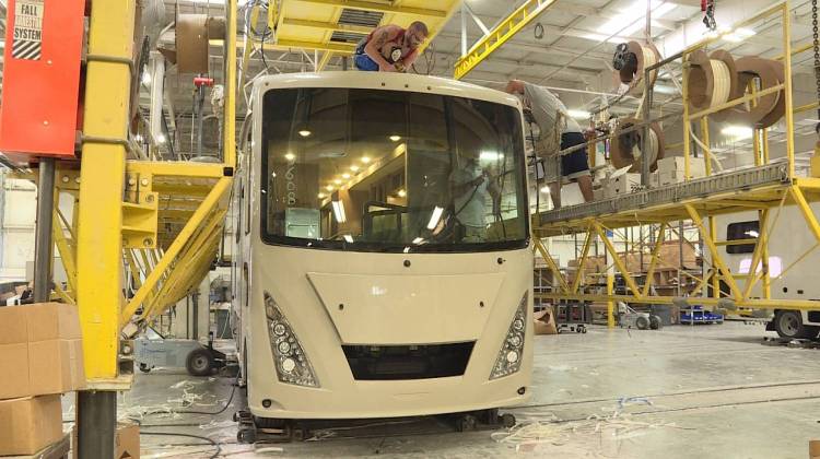 Workers assemble a new RV at Thor Motor Coach's Plant 750 in Elkhart. - JD Gray/WTIU