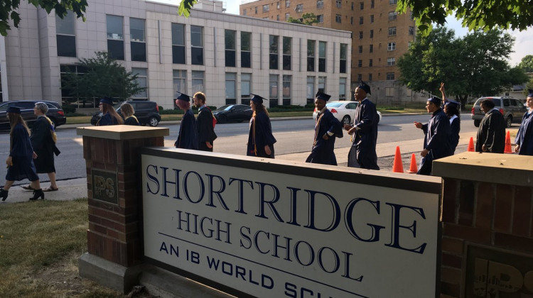 Shortridge High School graduates walk outside the school in 2018. - Twitter/Shortridge High School
