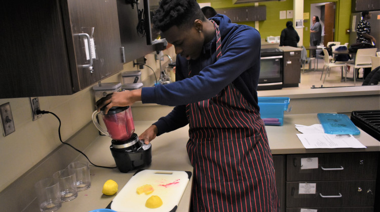 A student in a nutrition class makes a smoothie for a class assignment. - Justin Hicks/IPB News