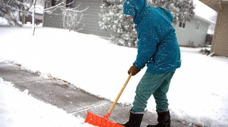 Shoveling snow can put a strain on the heart and muscles. - file photo