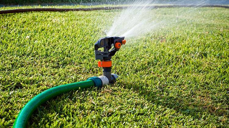 Citizens Energy Group says residents should not expect to see water restrictions, such as limitations on watering lawns, any time soon. - stock photo