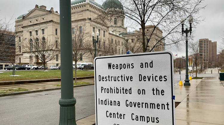 New signage outside the Statehouse announces the prohibition of weapons and destructive devices on the Indiana Government Center campus. - Brandon Smith/IPB News