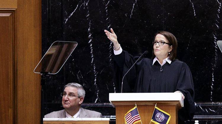Indiana Supreme Court Chief Justice Loretta Rush points to the gallery during the 2017 State of the Judiciary address. - Courtesy Indiana Courts via Flickr