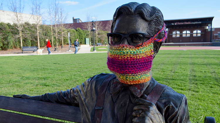 A statue of Orville Redenbacher in downtown Valparaiso with a knit mask over its face. - Justin Hicks/IPB News