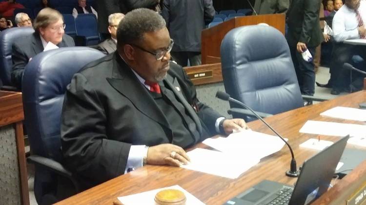 Indianapolis City-County Councilor Stephen Clay goes to his seat for the first time as president.  - Lauren Chapman/WFYI News