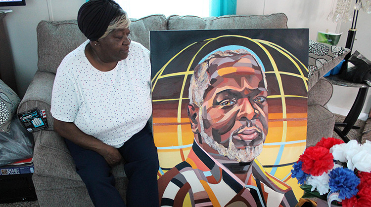 Shirley Newbill looks at a painting of her son, Eric Logan, on June 16, 2020. Logan was shot and killed in 2019 by a white South Bend police officer. - FILE: Annacaroline Caruso / WVPE Public Radio