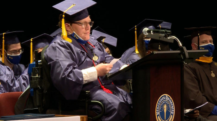 Parker Timberman speaks to his fellow graduates on Dec. 4 for mid-year commencement, during the first in-person ceremony from the school since Fall 2019.  - (Jeanie Lindsay/IPB News)