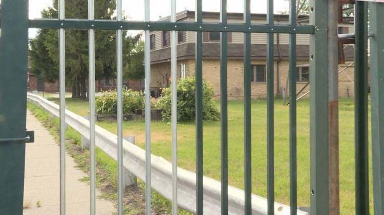 The West Calumet Housing Complex is fenced off after former residents have been relocated. - Annie Ropeik/IPB
