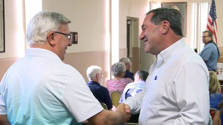 Sen. Joe Donnely (D-Ind.) greets a constituent at a campaign kick-off event for re-election in 2018. - WTIU/WFIU