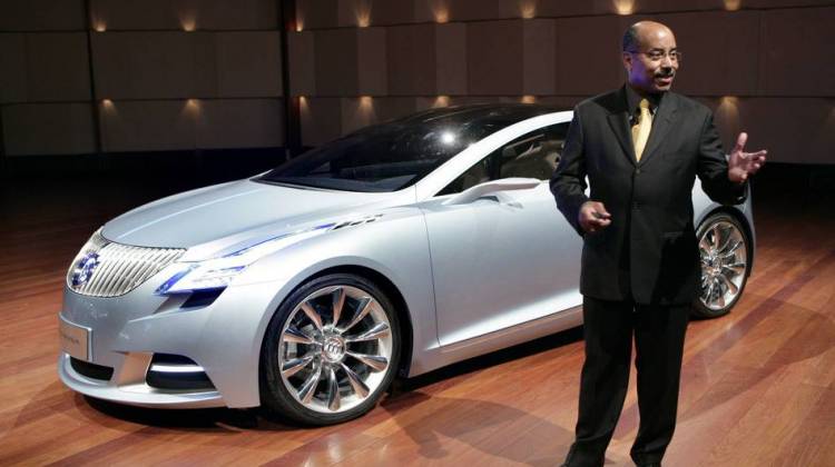 Ed Welburn, vice president of General Motors Global Design, stands with the Buick Riviera concept as it makes its North American debut at the North American International Auto Show in 2008 in Detroit.