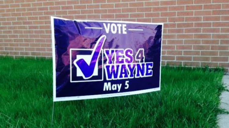 A sign supporting the referendum for Wayne Township schools outside the former Westlake Church of Christ near I-465, where the political action committee that supports the measure is based. - Eric Weddle / WFYI Public Media