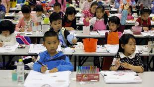 China Eases One-Child Policy, Ends Labor Camp system