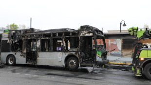 Bus fire on Meridian Street disrupts traffic, two passengers injured