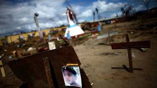 Filipino Priest Suffers With His Flock Amid Typhoon's Ruins