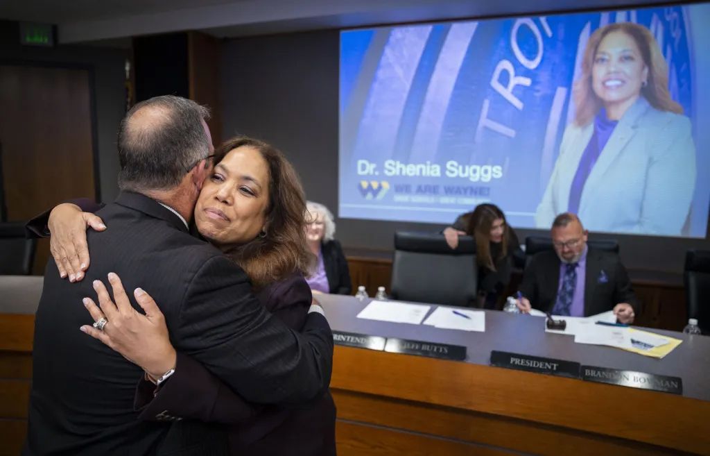 Current Wayne Township Superintendent Jeff Butts congratulates his successor, Shenia Suggs, on Oct. 6, 2025.