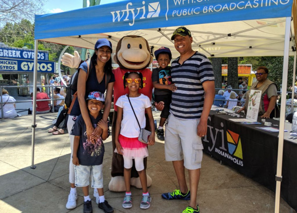 Curious George with Family at Meet and Greet