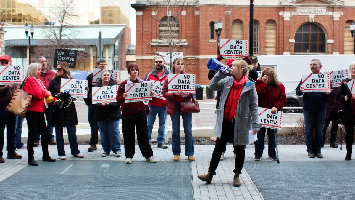 Protesters from Decatur Township chant outside of the City-County Building in downtown Indianapolis on Feb. 26, 2026. Later that afternoon, the Metropolitan Development Commission’s hearing examiner recommended approval of the proposal for a data center from Sabey, a Seattle-based developer.